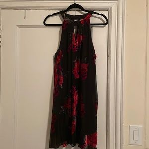 Sheer black dress with velvet floral detailing. Size large.